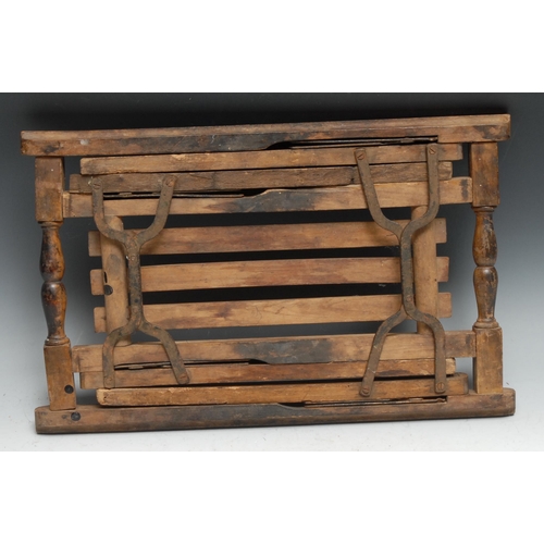 115 - A campaign type folding stool, 40cm wide, c.1900