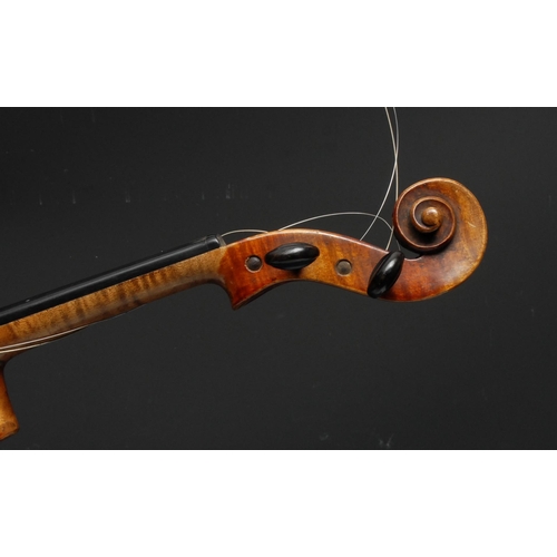 206 - A violin, the two-piece back 31cm long excluding button, paper Stradivarius label, ebonised tuning p... 