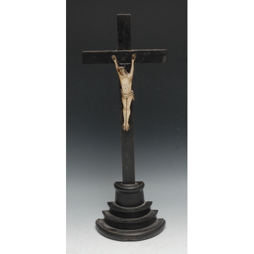 322 - A French bone corpus Christi, probably Napoleonic prisoner of war, ebonised cross, stepped base, 46.... 