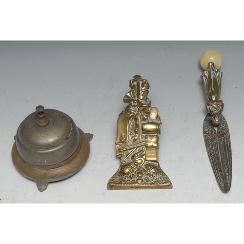 53 - A 19th century gilt brass and alabaster letter knife, as a celestial being, with lofty wings, standi... 