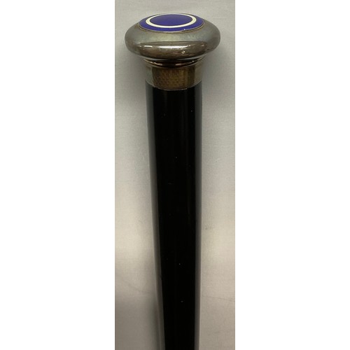 27 - A George V silver and guilloche enamel topped dancing cane, ebonised shaft, 113cm long, London 1924