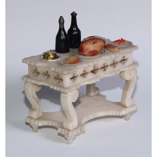 321 - A French alabaster table, carved and painted as a table laden with food, 13cm wide, c.1880