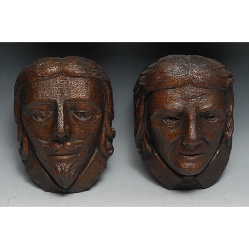 253 - The English Civil War - a pair of 19th century oak carved portrait bosses, Charles I and Oliver Crom... 