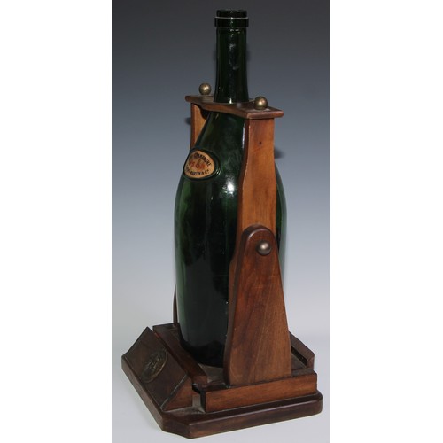 139 - A large French cognac pouring cradle, Remy Martin Cognac, holding a large green vacant bottle, Fine ... 