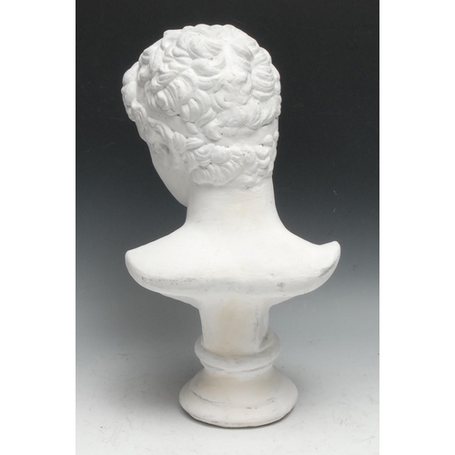 490 - After the antique, a plaster library bust, head of Apollo, waisted socle, 40cm high