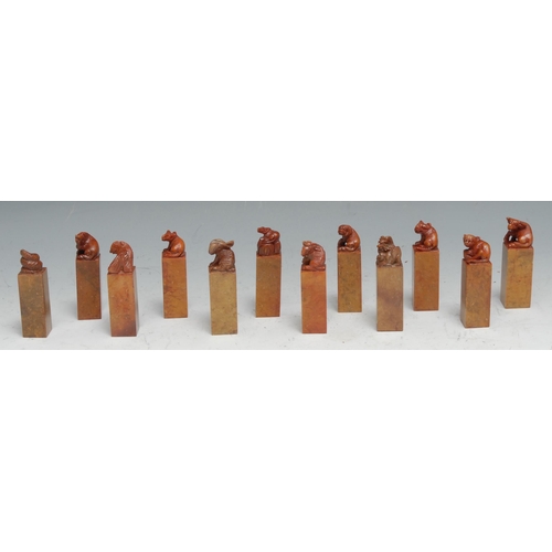 122 - A collection of Chinese soapstone seals, 6.5cm high (12)