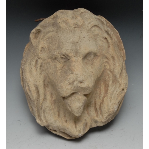 262 - A 19th century stone architectural boss, as the head of a lion, 25cm long