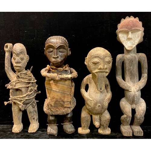 713 - Decorative Tribal Art and the Eclectic Interior - an African fertility figure, standing with tongue ... 