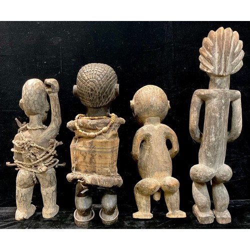 713 - Decorative Tribal Art and the Eclectic Interior - an African fertility figure, standing with tongue ... 