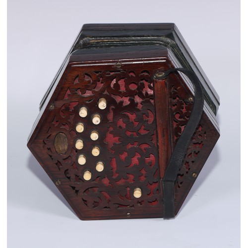 38 - A 19th century concertina, by Jones & Son, London, fretwork pierced hexagonal ends, green leather be... 