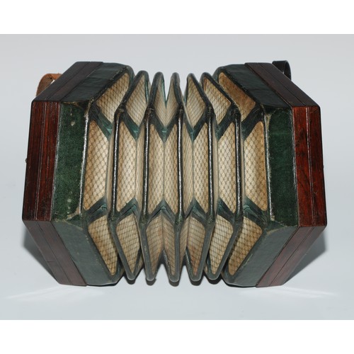 38 - A 19th century concertina, by Jones & Son, London, fretwork pierced hexagonal ends, green leather be... 