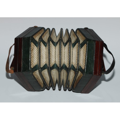 38 - A 19th century concertina, by Jones & Son, London, fretwork pierced hexagonal ends, green leather be... 