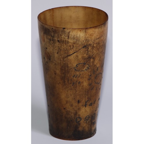 265 - A 19th century tapered cylindrical cattle horn beaker, sgrafitto scrimshaw engraved with sun, rainn,... 