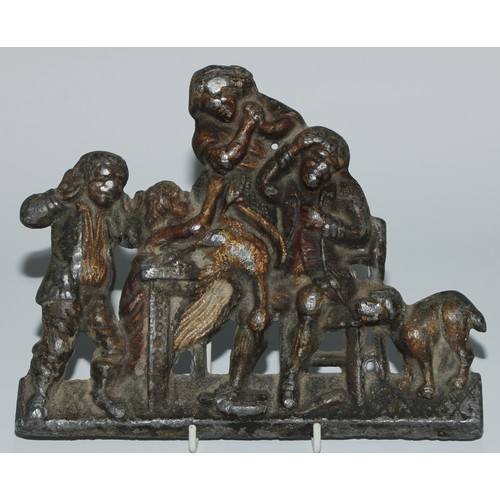 111 - A 19th century lead plaque, cast with a genre scene, 21cm wide