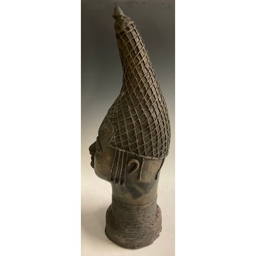 708 - Decorative Tribal Art and the Eclectic Interior - a Benin bronze bust, 60cm high, Nigeria, 20th cent... 