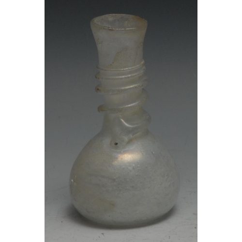 836 - Antiquities - a Roman glass vase, iridescent surface, coil to neck, 11cm high