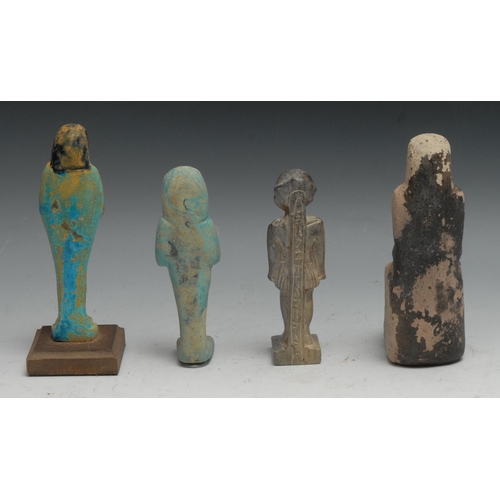 844 - Antiquities - an Ancient Egyptian turquoise faience shabtim 15cm high, Late Period; another, similar... 