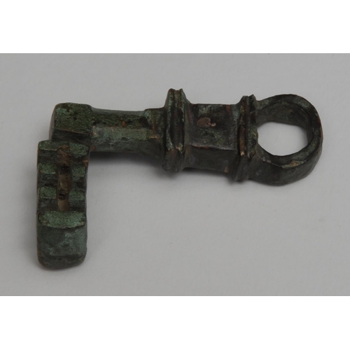 845 - Antiquities - Copoclephilia - a Roman bronze key, 5cm long, c.1st century AD

Provenance: Acquired b... 