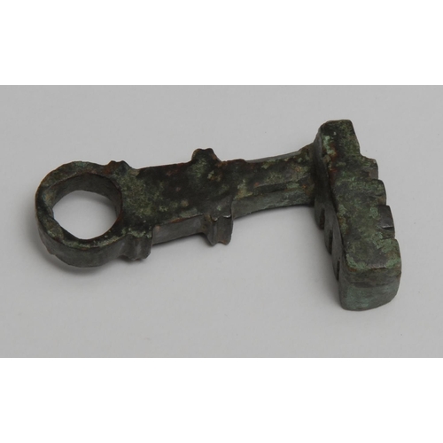 845 - Antiquities - Copoclephilia - a Roman bronze key, 5cm long, c.1st century AD

Provenance: Acquired b... 