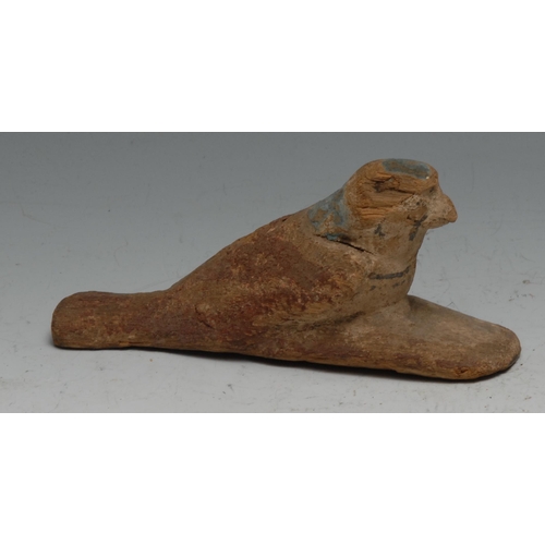 834 - Antiquities - a Ptolemaic Egyptian carved wooden depiction of Horus (falcon), 13.5cm long, Late Peri... 