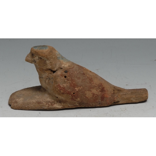 834 - Antiquities - a Ptolemaic Egyptian carved wooden depiction of Horus (falcon), 13.5cm long, Late Peri... 