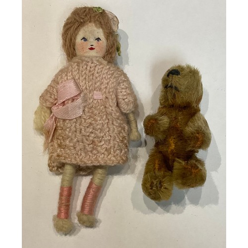 275 - Toys & Juvenalia - an early 20th century miniature jointed golden mohair teddy bear, 6cm high and a ... 