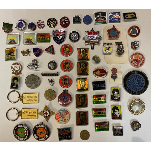 280 - A collection of enamel and other badges, including Butlins, advertising, motor cycling, royal, rock ... 