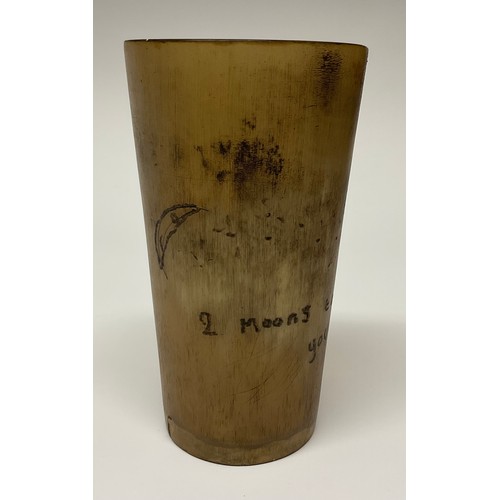 59A - A 19th century horn beaker, sgraffito scrimshaw engraved as a love token with lunar crescents and in... 