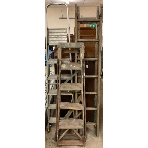 328 - A set of metal step ladders;  a set wooden step ladders;  others