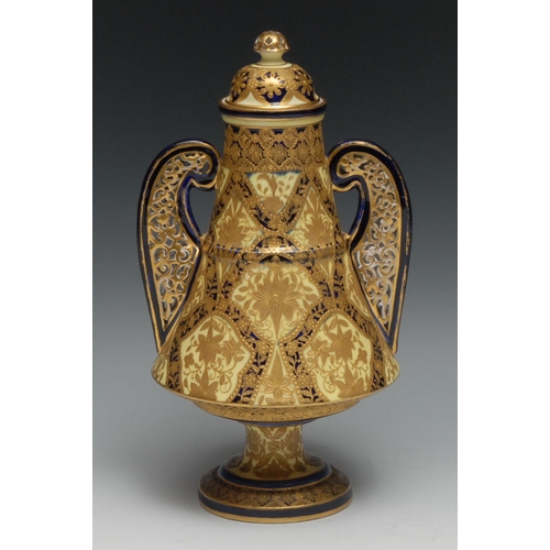 373 - A Derby Crown Porcelain Company two handled reticulated vase and cover, applied in tooled raised gil... 