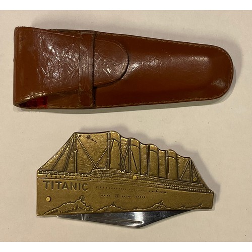 449 - A Titanic penknife; a multi-tool penknife (2)