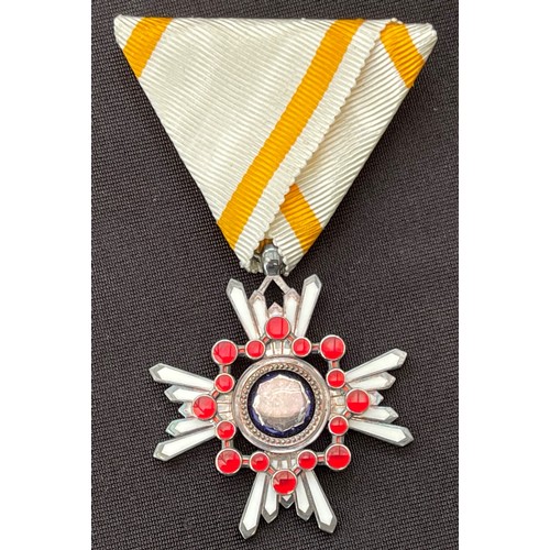 3031 - Japanese Order of Sacred Treasure 6th Class complete with ribbon and ribbon devise in black lacquere... 