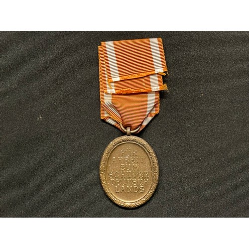 3068 - WW2 Third Reich Deutsches Schutzwall-Ehrenzeichen - West Wall Medal. Early issue example in Tombak a... 