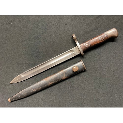 3083 - Model 1895 Chilean Mauser Bayonet with fullered single edged blade 250mm in length. Maker marked 