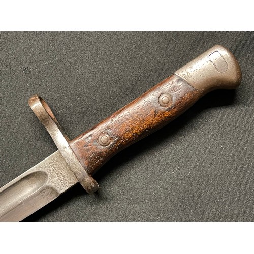 3083 - Model 1895 Chilean Mauser Bayonet with fullered single edged blade 250mm in length. Maker marked 