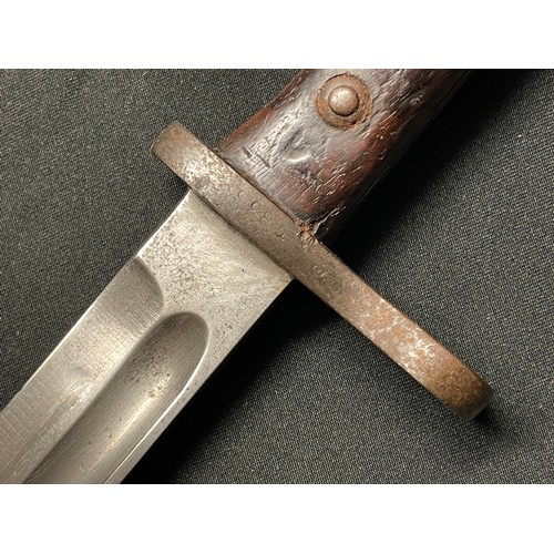 3083 - Model 1895 Chilean Mauser Bayonet with fullered single edged blade 250mm in length. Maker marked 