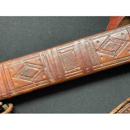 3085 - A Sudanese Kaskara sword with double edged blade 855mm in length. Brass crossguard. Leather bound gr... 