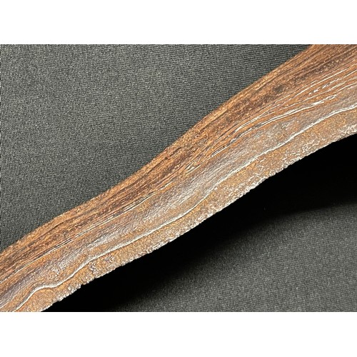 3095 - An Indonesian kris, 32cm wavy blade with pronounced pamor, hardwood hulu carved as a stylised lotus,... 