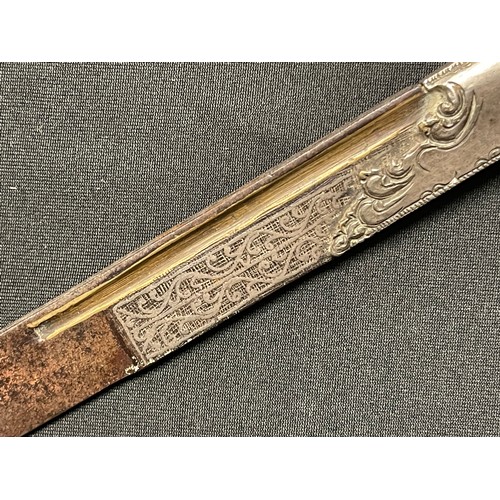 3109 - A Sinhalese Piha kaetta dagger, 15cm blade damascene in silver and koftgari, horn handle carved with... 