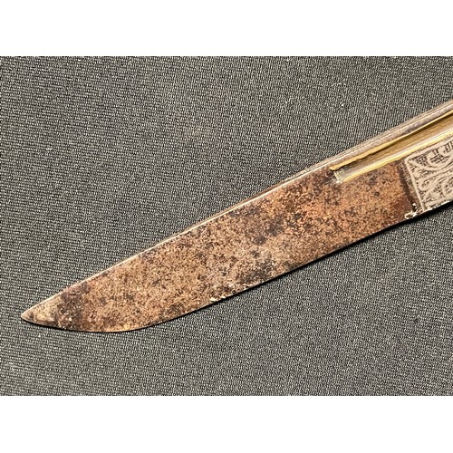 3109 - A Sinhalese Piha kaetta dagger, 15cm blade damascene in silver and koftgari, horn handle carved with... 