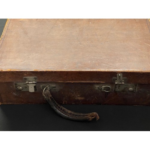 3141 - A WW1 brown leather case, containing a Royal Army Chaplain's Department portable field communion set... 