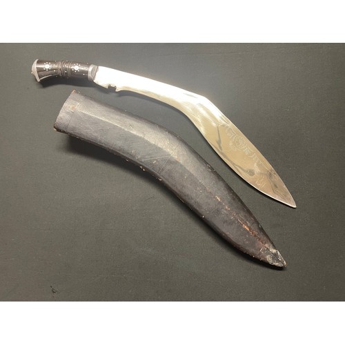 3171 - Gurkha Kukri knife with large 44cm long single edged bright steel blade. Punch marked decoration to ... 