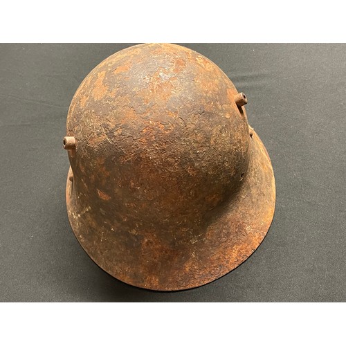 3175 - Czech M30 Steel Helmet, Spanish Civil War example. No liner. Has remains of part of the chinstrap. I... 