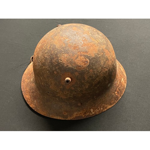 3175 - Czech M30 Steel Helmet, Spanish Civil War example. No liner. Has remains of part of the chinstrap. I... 