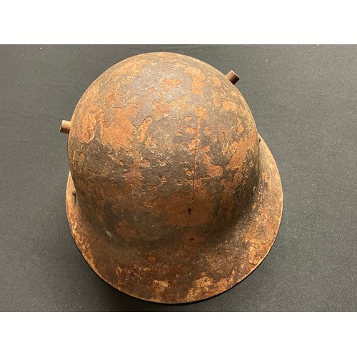 3175 - Czech M30 Steel Helmet, Spanish Civil War example. No liner. Has remains of part of the chinstrap. I... 