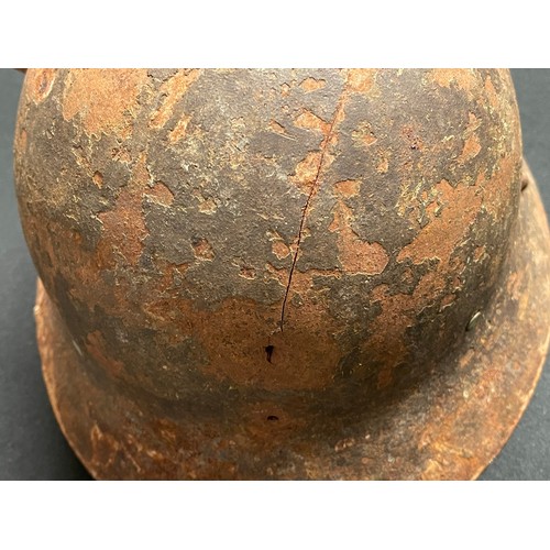 3175 - Czech M30 Steel Helmet, Spanish Civil War example. No liner. Has remains of part of the chinstrap. I... 