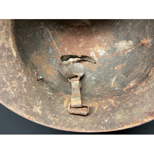 3175 - Czech M30 Steel Helmet, Spanish Civil War example. No liner. Has remains of part of the chinstrap. I... 