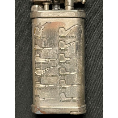 462 - A pipe lighter, engraved with various pipe profiles, removeable tamping tool, with pouch, Corona, Ja... 