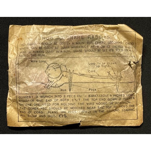 3214 - WW2 British RAF Emergency Survival Kit Rabbit Snare in original cellophane wrapper.