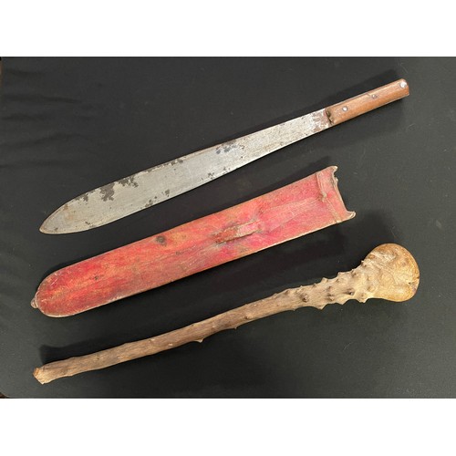 3220 - WW2 American made US True Temper Machete, dated 1944, 53cm long complete in a red leather scabbard; ... 